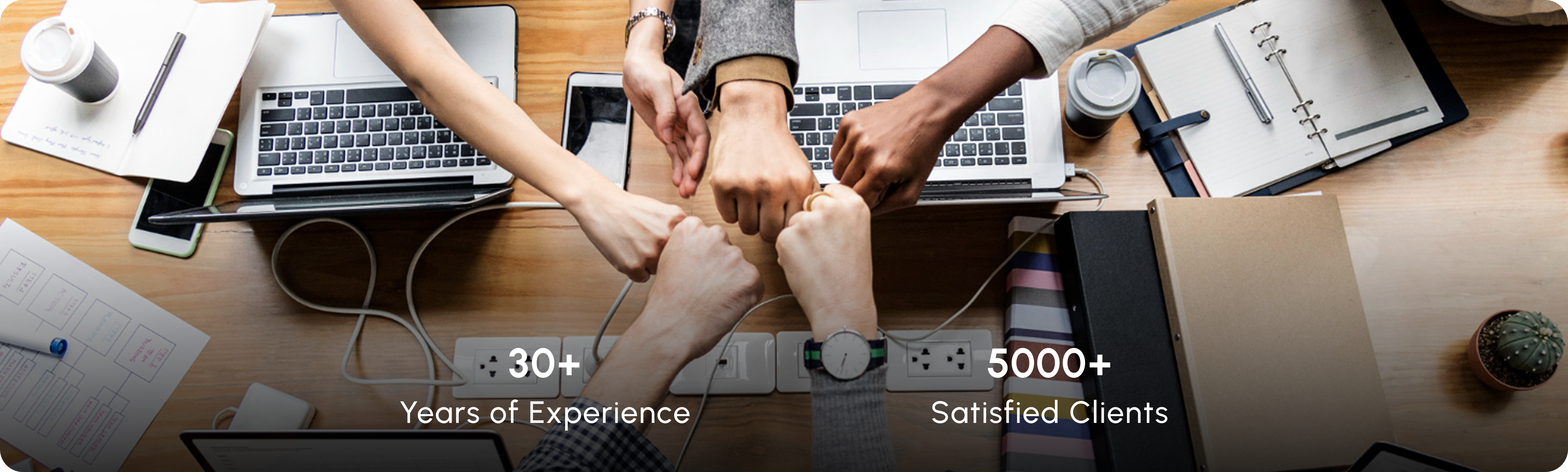 Panamax team members collaborating with hands joined together